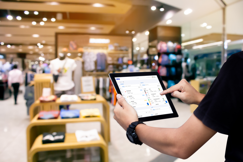 Person in store using Logile technology