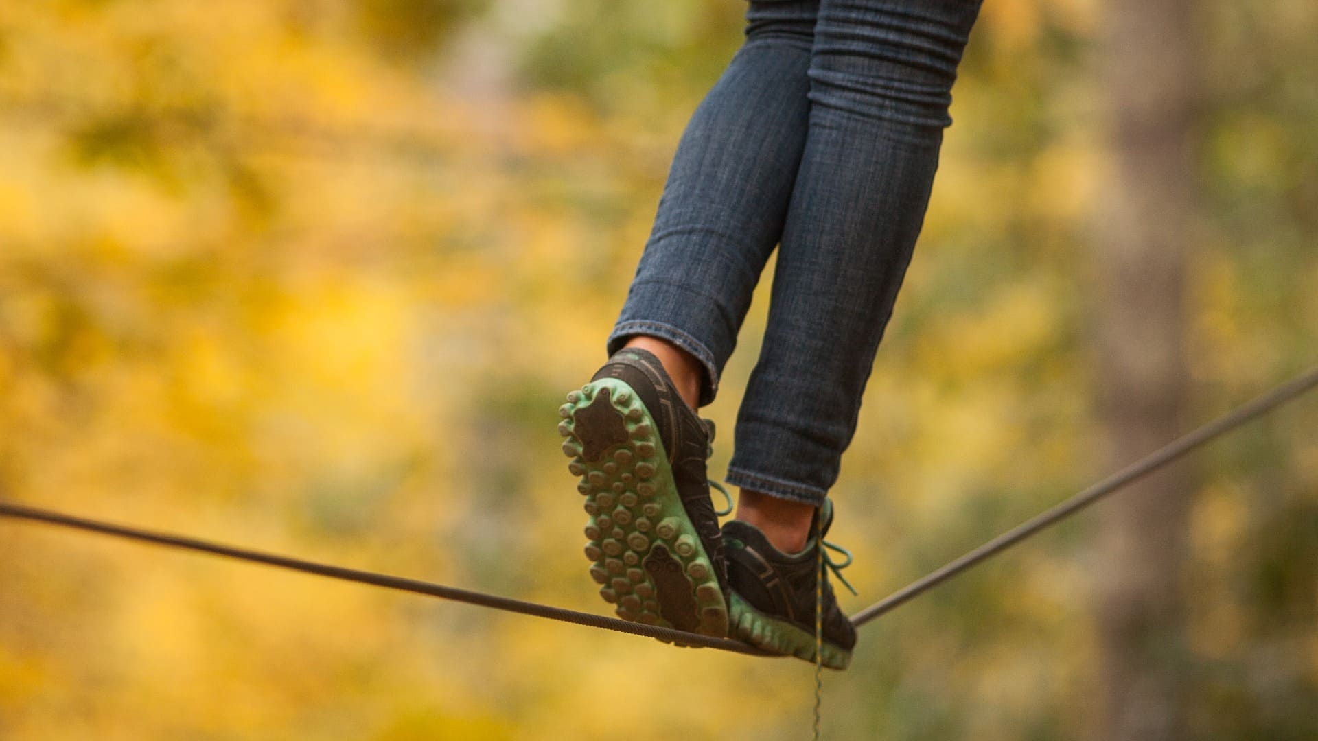 woman balancing of rope