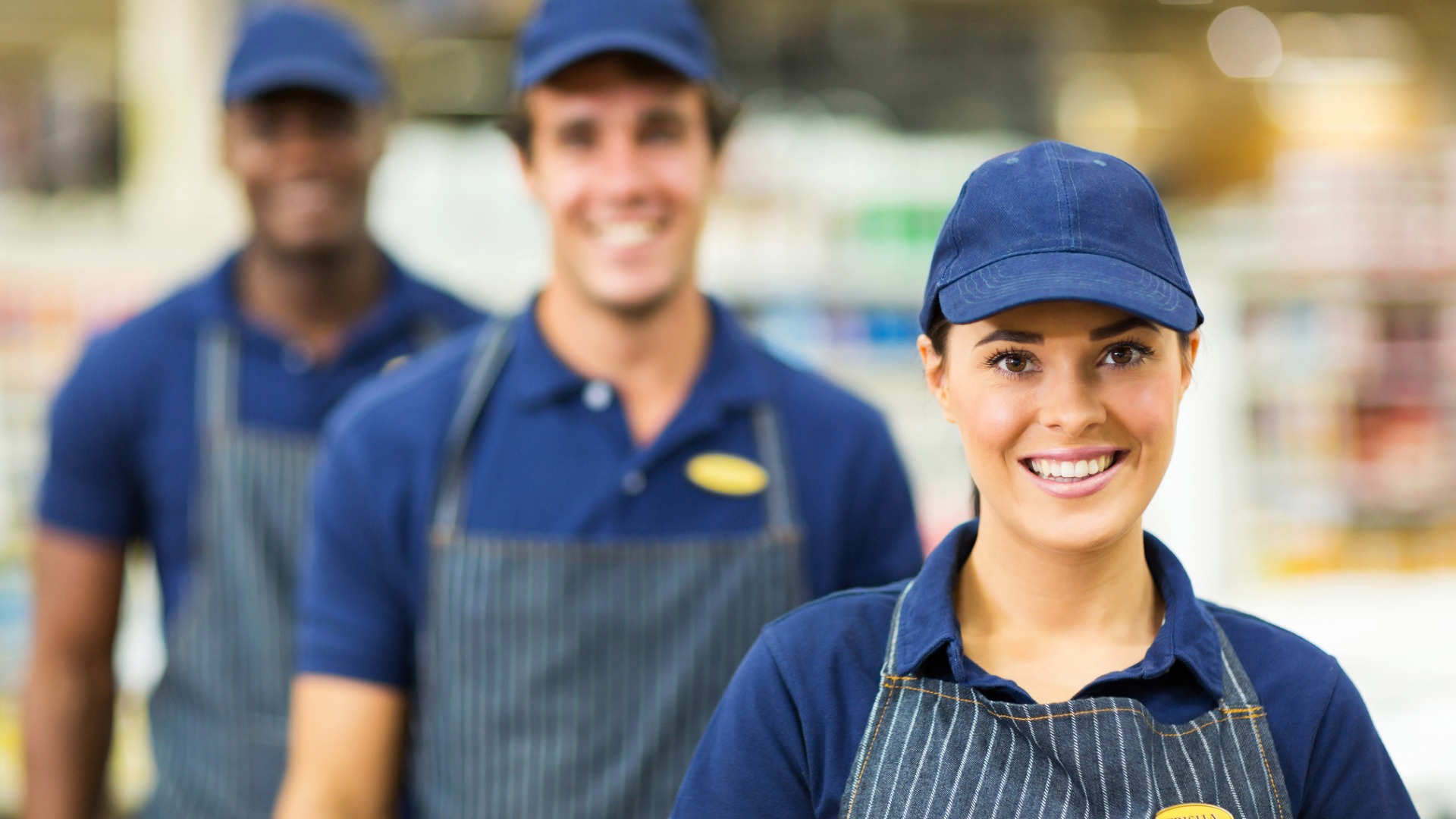 employees in aprons and hats