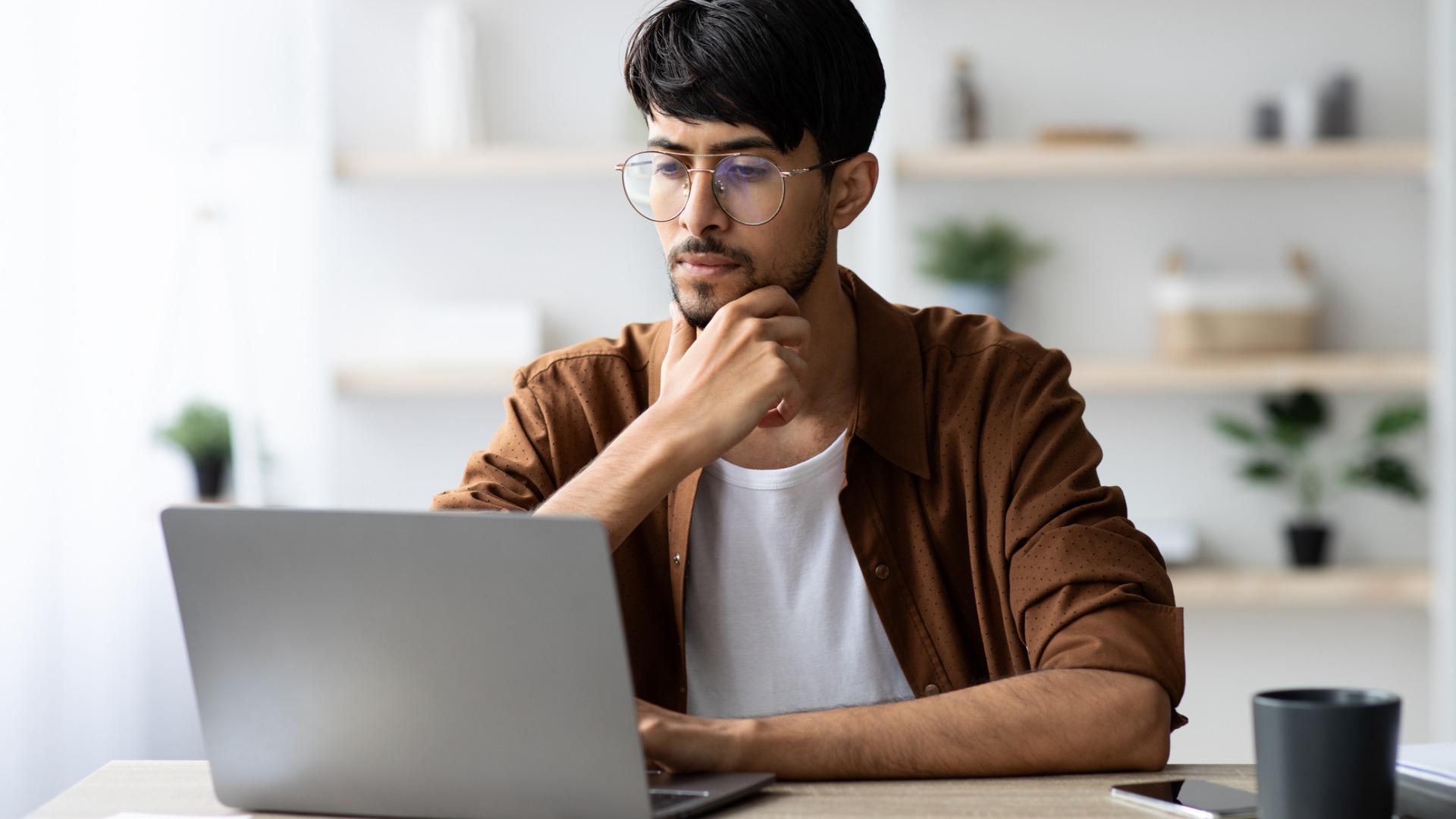 man working at a laptop
