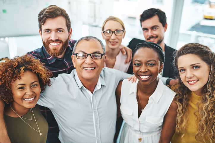 Portrait of a group of businesspeople standing together in an office
